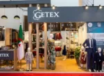 Stand du holding Getex au salon Texstyle Expo 2026, Safex Alger — exposition de produits textiles, cuir et habillement fabriqués en Algérie, avril 2026.